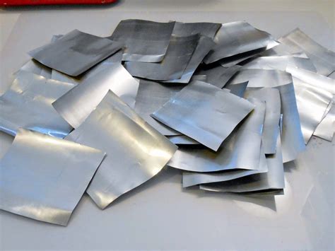 fabricate charms out of aluminum|making jewelry from aluminum cans.